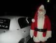 Le père NOEL devant sa Limousine